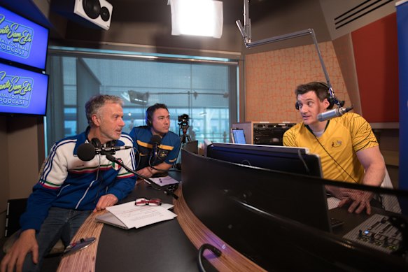 Santo Cilauro, Sam Pang and Ed Kavalee recording their podcast during the 2018 Football World Cup.