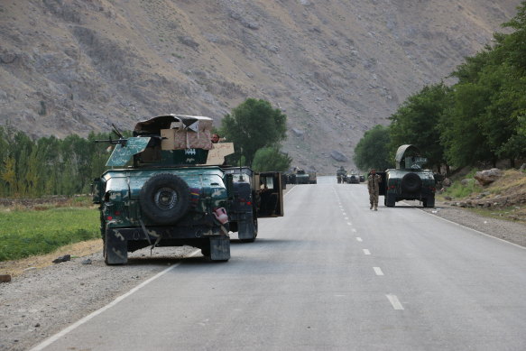 Feeling Afghan soldiers pause on a road at the front line of fighting between Taliban and security forces,  near the city of Badakhshan, northern Afghanistan on Sunday.
