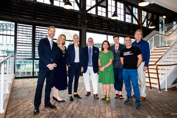 Arts Minister Don Harwin, fourth left, with the heads of the arts companies who are moving into the new-look wharf.