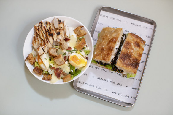 This Way Canteen’s chicken caesar salad and garlic falafel sandwich.