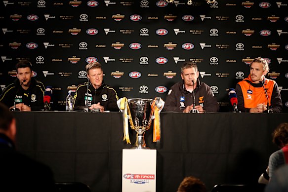 Richmond captain Trent Cotchin, coach Damien Hardwick, Giants coach Leon Cameron and captain Phil Davis on Friday.