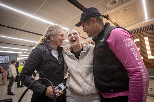 Annabelle Williams is reunited at Melbourne Airport with her parents Justin and Drusilla.