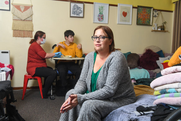 Jess Stevens with her son Jerrah and a carer.