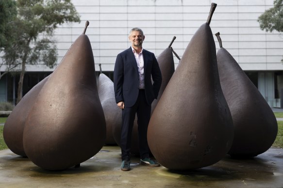 National Gallery of Australia director Dr Nick Mitzevich with Pear - version number 2, 1973, by George Baldessin.