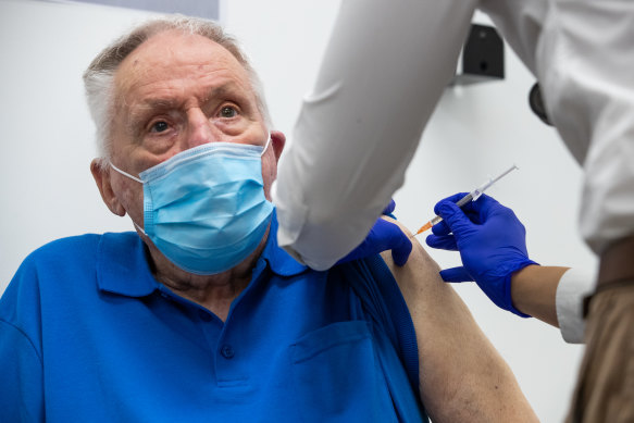 John Healy receiving his Pfizer vaccine on Sunday.