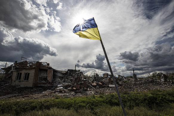 A Ukrainian flag waves in the village of Dolyna in Donetsk Oblast, Ukraine after the withdrawal of Russian troops in September.