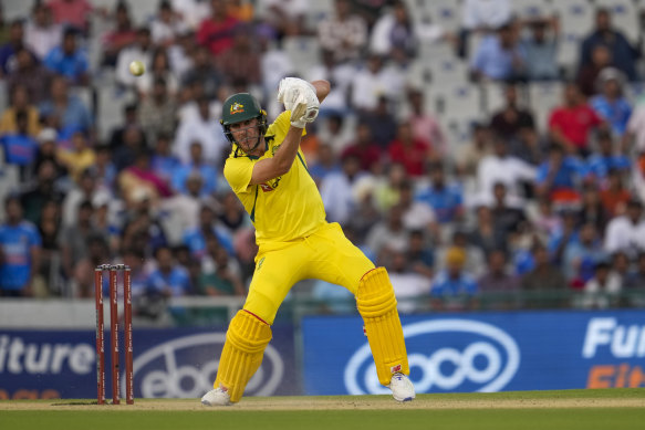 Australia’s captain Pat Cummins tries to boost the run rate late in the innings.