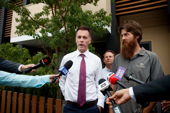 Labor leader Chris Minns visited renter Michael Abbott in Schofields during the campaign for a policy announcement.