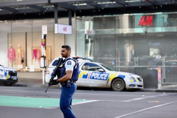 Ambulance and police vehicles in downtown Auckland amid reports of a shooting in July.