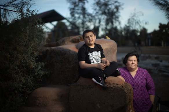 Marlyn Torres and son Ali, 9, are relieved the Royal Children’s Hospital will continue to fund the arts therapy program, which Ali benefits from.