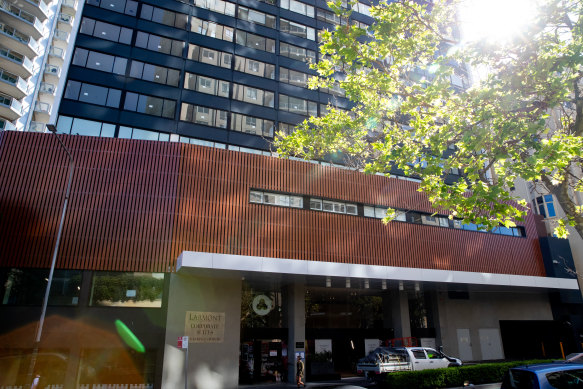 The mural “Here Lies Your Story” current stands behind a taped sheets at the Hotel Indigo in Potts Point.