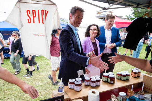 NSW Labor leader Chris Minns, federal MP for Bennelong Jerome Laxale, and Labor candidate for Ryde  Lyndal Howison meet locals at Ryde Wharf Markets.