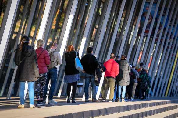 Melburnians queue up for vaccination at the Convention and Exhibition Centre.