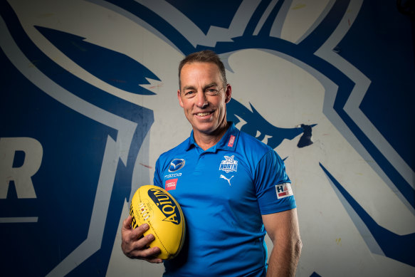 Alastair Clarkson won four premierships as coach of the Hawks and will delay his start at North Melbourne.