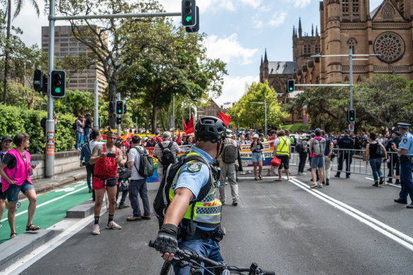The protesters marching through Sydney.