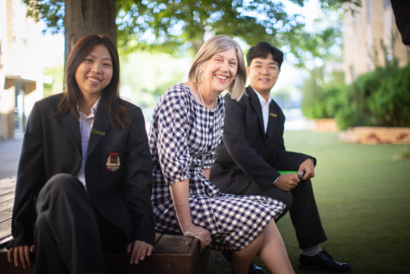International students Meilee Rianrukwong and Ryan Shan, pictured with Camberwell High principal Jillian Laughlin, are enjoying Melbourne.