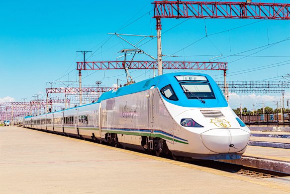 High-speed Afrosiyob on the platform of Bukhara railway station, Uzbekistan.