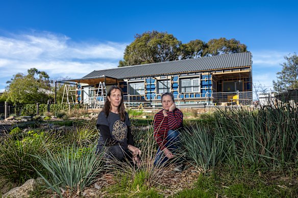 Bec Nicoll and Sarah Thomson  at their nearly completed resilient home in Kialla, near Shepparton.