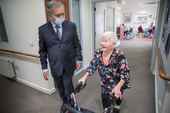 Afif Hadj from Hope Aged Care with resident Mei Mei Chiang, who has lived at the company’s Brunswick centre for eight years.