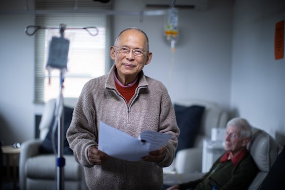 Eng and a patient receiving a curcumin infusion.