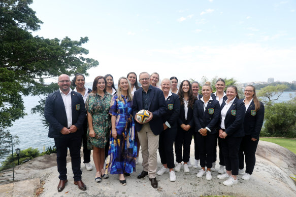 Prime Minister Anthony Albanese poses for photos with the Wallaroos players at Kirribilli House.