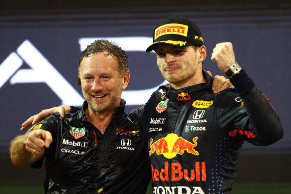 Christian Horner (left) celebrates with 2021 F1 World Drivers at the Abu Dhabi Grand Prix last December.