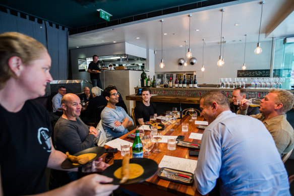 Diners at Fix Wine Bar and Restaurant in Sydney's CBD.