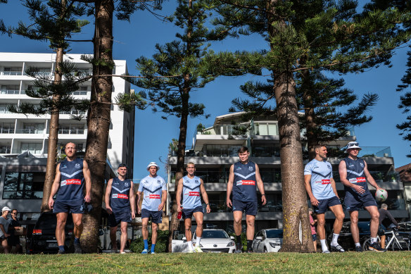 James Roby (far left) and his St Helens teammates have soaked up the sun at Manly all week.
