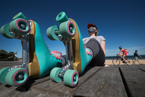 Jessica Maddock wears her skates at St Kilda beach.