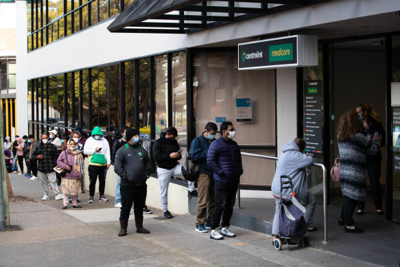 The queue for Centrelink in Campsie stretches down the street during Sydney’s lockdown.