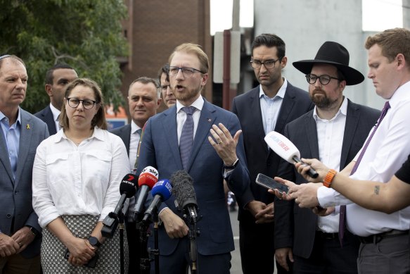 Josh Burns (centre right) claims James Paterson (speaking) agreed to read out his words before Peter Dutton intervened.