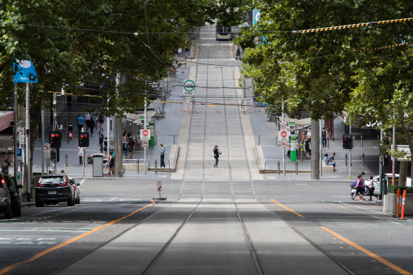 A deserted Bourke Street in locked-down Melbourne.