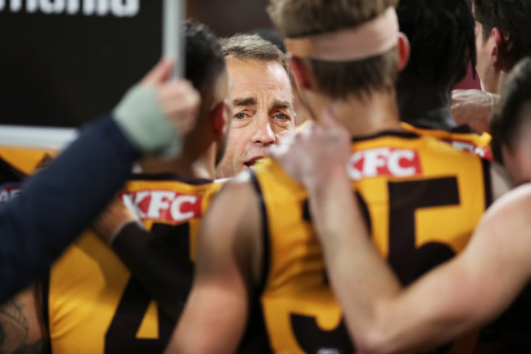 Alastair Clarkson speaks to his players during the clash with Sydney last month.