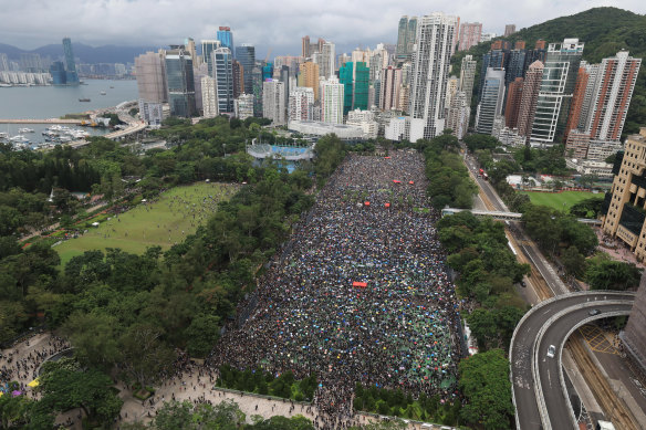 Protesters gather during a rally at Victoria Park in Hong Kong on Sunday.