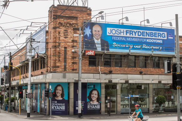 Josh Frydenberg and rival Monique Ryan with duelling advertising in the Kooyong electorate.
