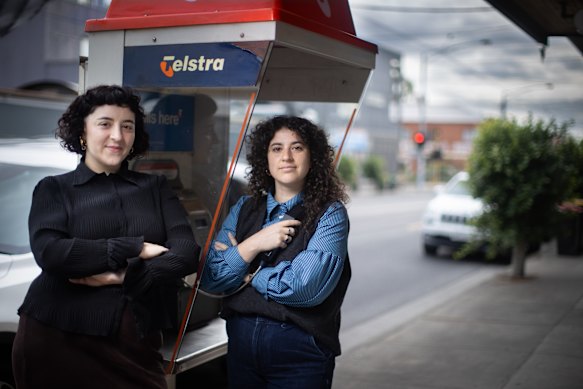 Giulia Di Sipio (left) and Jordy Kornfeld run the closest mental health service to the Brunswick West public phone box Telstra wants heritage listed.