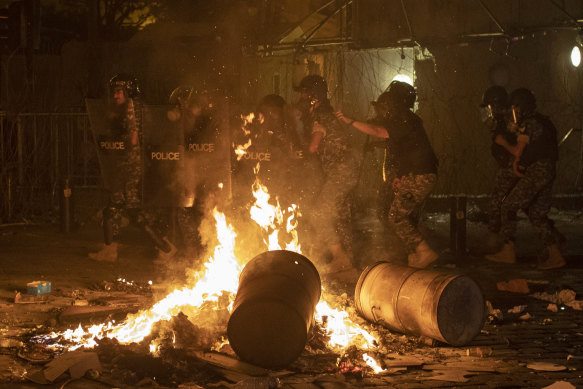 Riot police and soldiers responded when protests erupted against Lebanon's political elites after the blast.