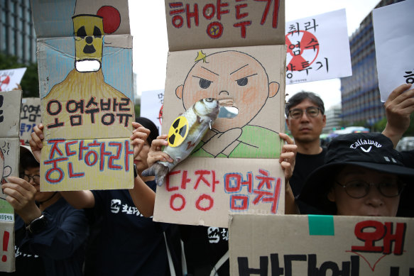 South Korean protesters decry the Japanese government’s decision to release the Fukushima water on Thursday. 