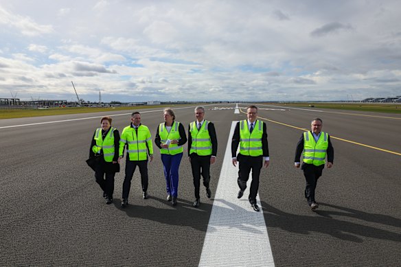 Infrastructure and Transport Minister Catherine King (third from left) announced the authorisation of the amended paths. 