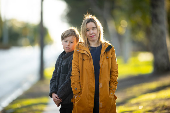 Becky McDonagh and her son Harry. Harry attends St Joseph’s, one of four Catholic schools that might close. 