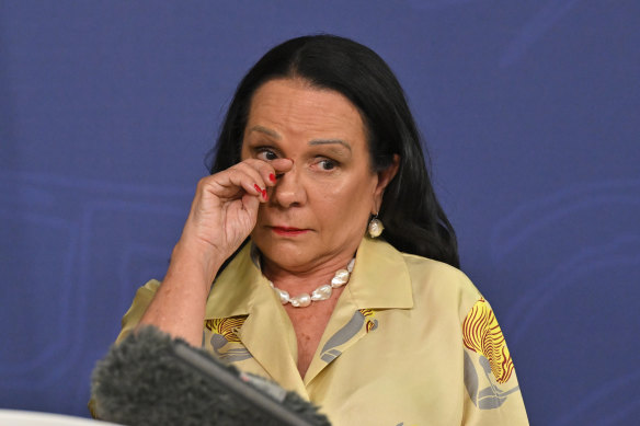 Minister for Indigenous Australians Linda Burney wipes away a tear at a press conference in Sydney. 