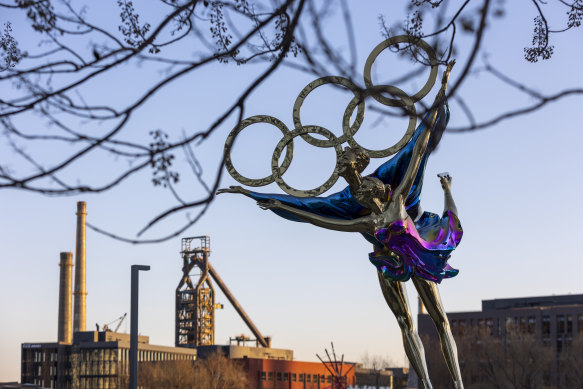 A statue celebrates the Olympics in Beijing. The 2022 Winter Olympics start on February 4
