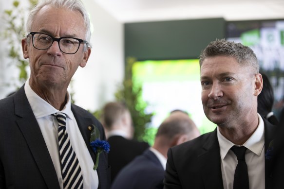 Tabcorp director David Gallop closely watching the runners with former Australian cricket captain Michael Clarke.