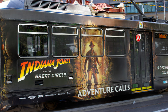 An ad for holiday blockbuster game Indiana Jones and the Great Circle on a Melbourne tram.