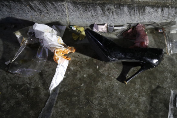 The belongings of victims are seen at the scene of a deadly stampede in Seoul, South Korea.