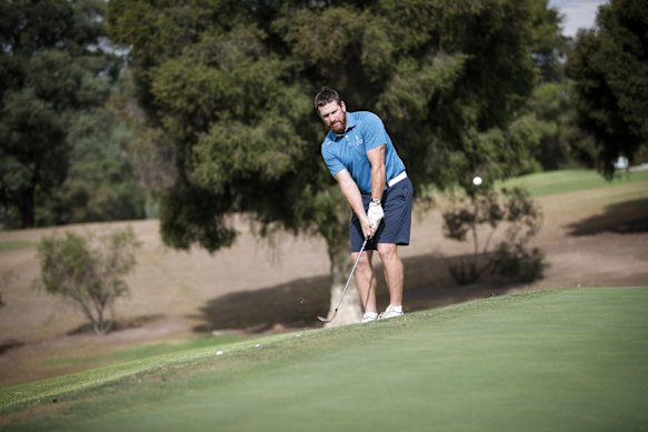 Akermanis (pictured) has been banned from several golf courses.