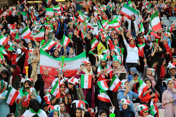 Women fans were restricted to one area of the stadium at the Iran-Cambodia match.