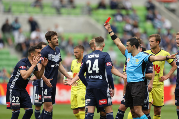 Kristian Dobras is shown the red card. 