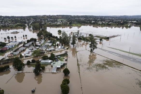 Low-lying parts of Singleton are inundated by floodwaters along the Hunter River on Thursday.