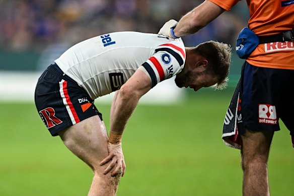 Sam Walker is taken of for a HIA.